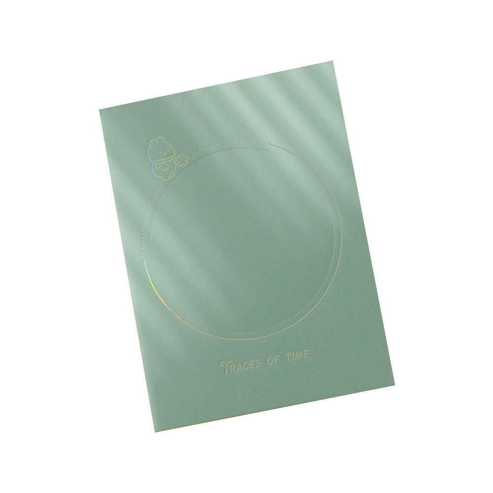 Blue notebook with circle outline on cover