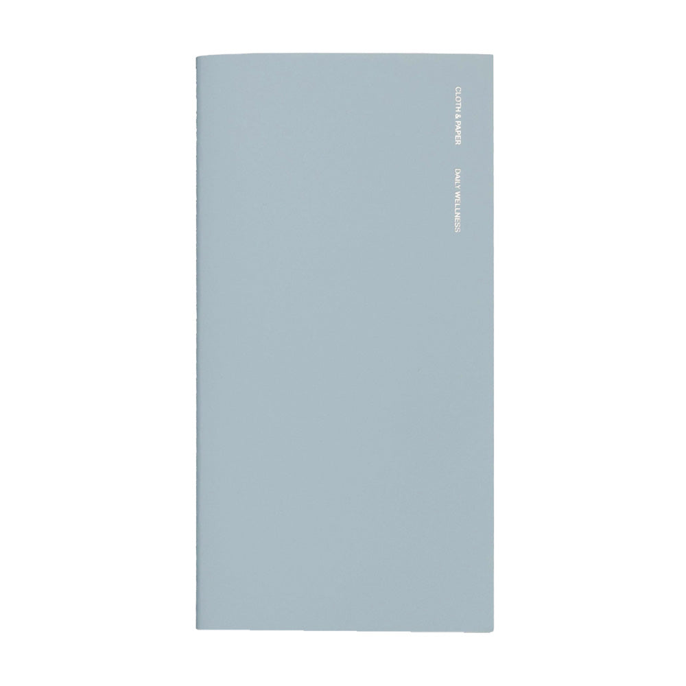 Light blue notebook with foil lettering on the front