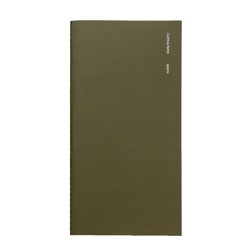 Green notebook with foil lettering on the front
