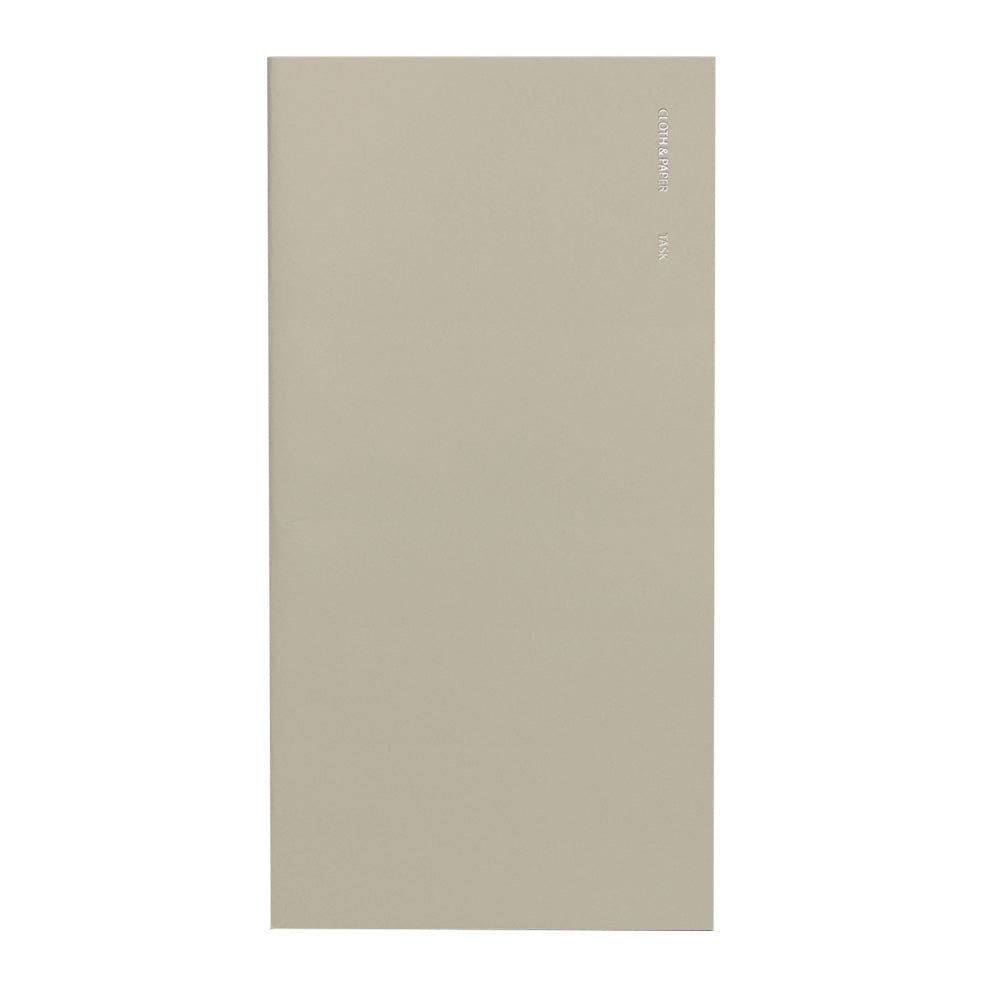 Beige notebook with foil lettering