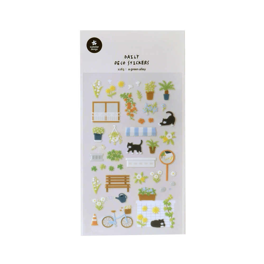 Sticker sheet with windows, benches, flowers, a black and white cats.