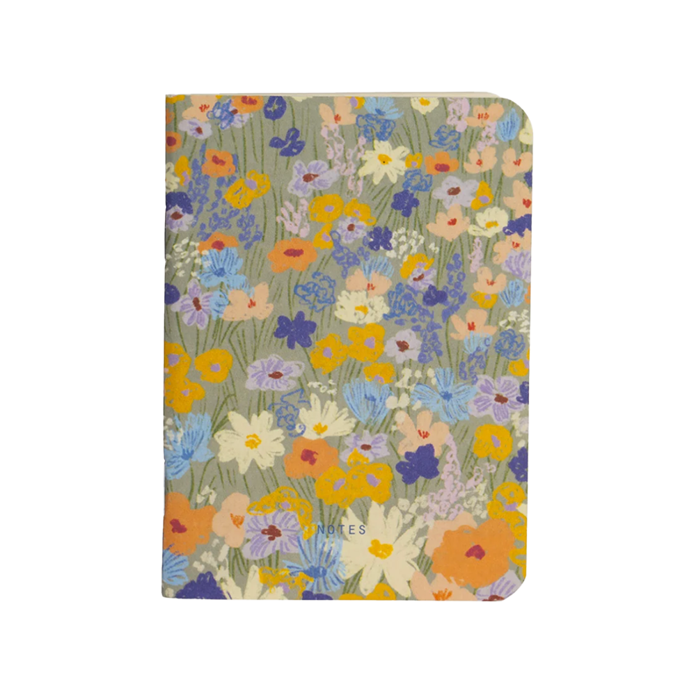 Floral patterned notebook with 'Notes' text on a white background