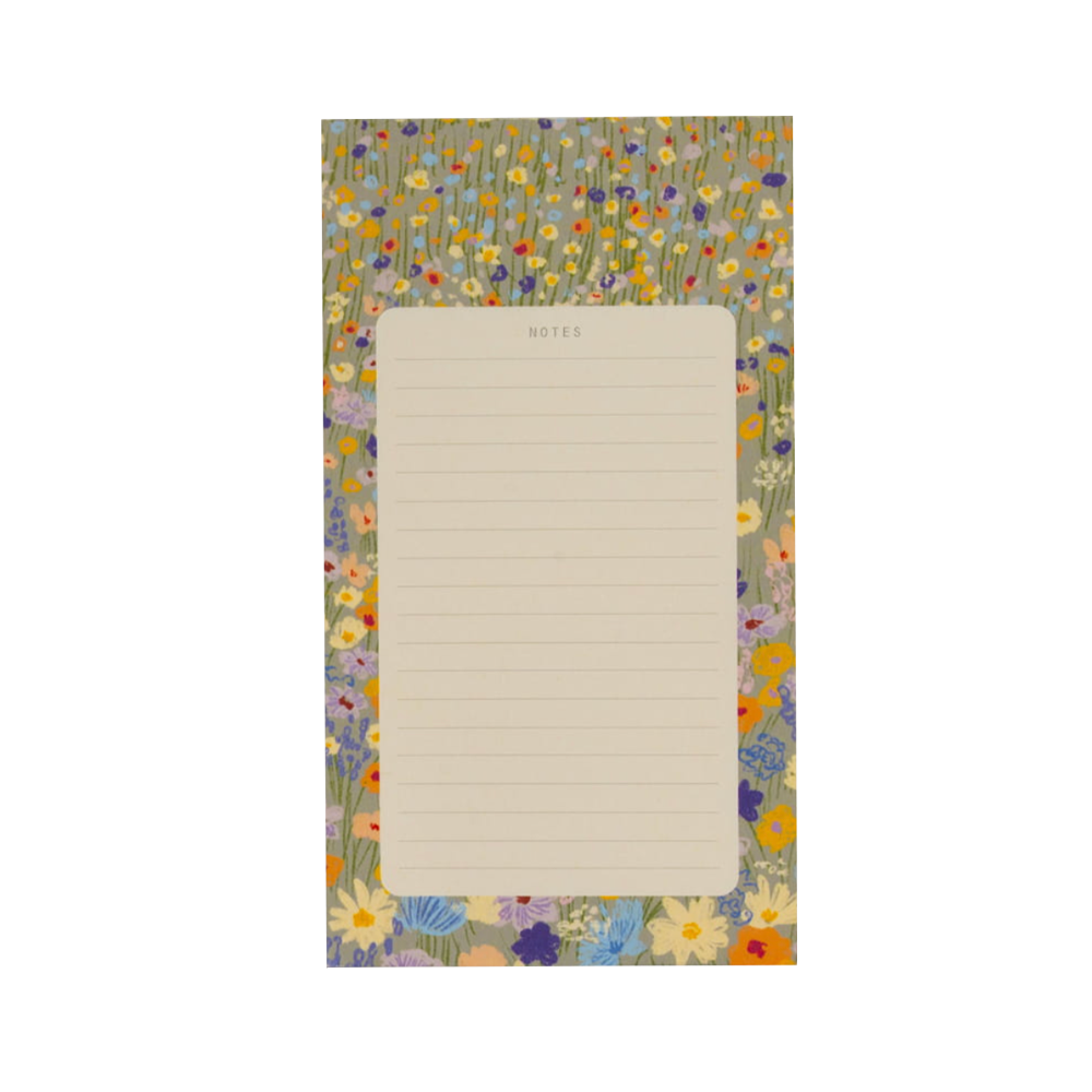 Floral-patterned notepad with lined paper on a white background