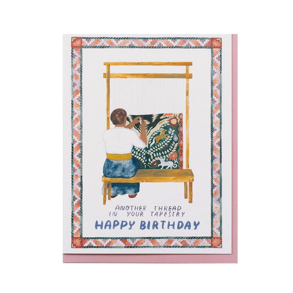 Greeting card with illustration of a person weaving and text 'Another thread in your tapestry Happy Birthday'.