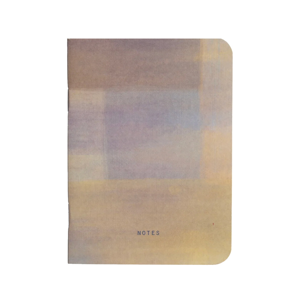 Mini notebook with a painted design and the word "Notes" at the bottom.
