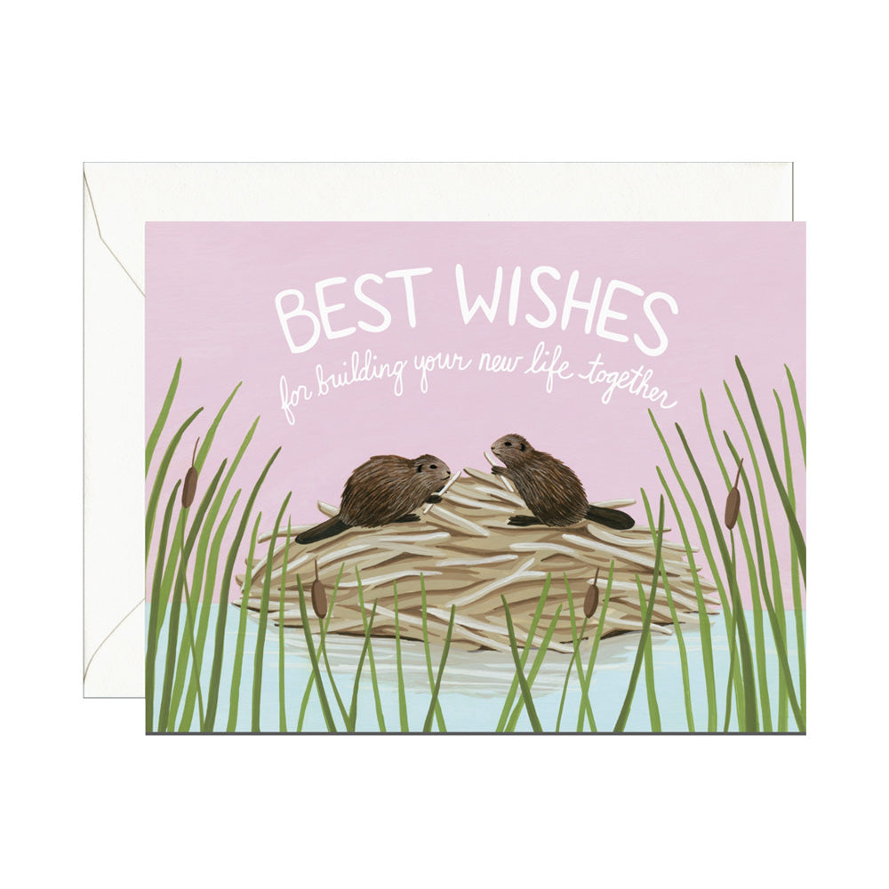 Greeting card with two beavers on a log and 'Best Wishes for building your new life together' text.