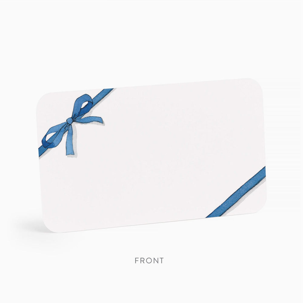 White card with a blue ribbon on a white background