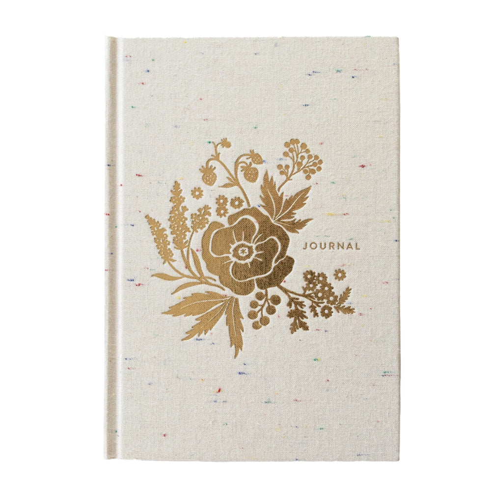 Cream journal with a gold foil flower and the word "JOURNAL" on the front.