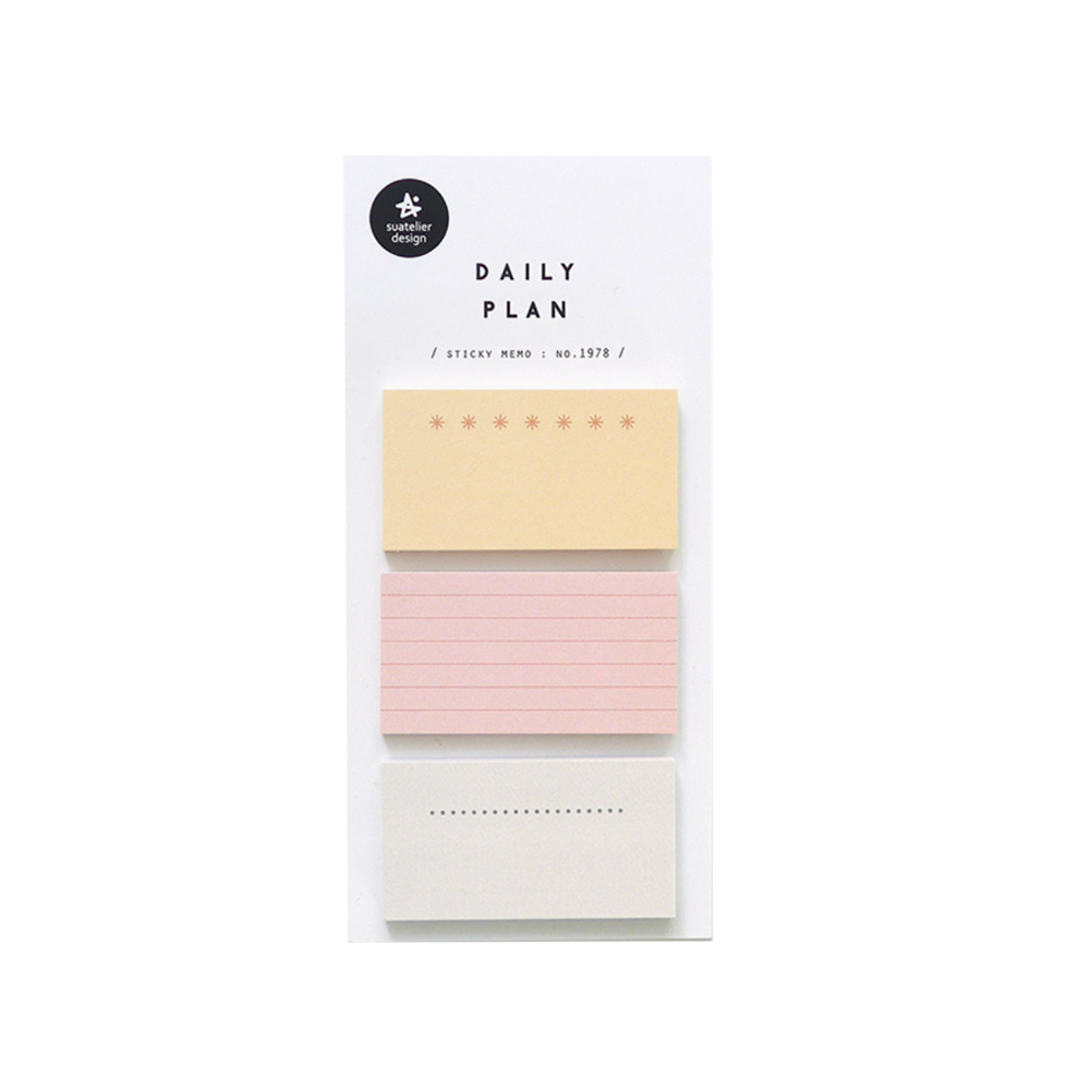Pack of sticky notes with pastel colors on a white background