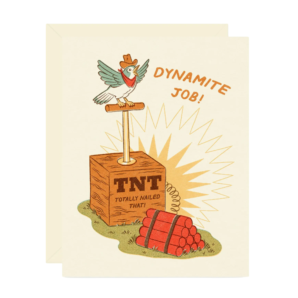 Congratulations greeting card of a bird sitting on a box of TNT with dynamite being lit next to it with the text "Dynamite job!"