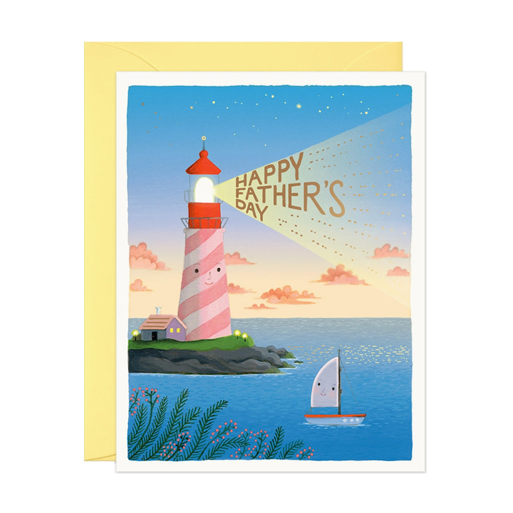 Father's Day card with a lighthouse and sailboat on a blue background and text "Happy Father's Day"