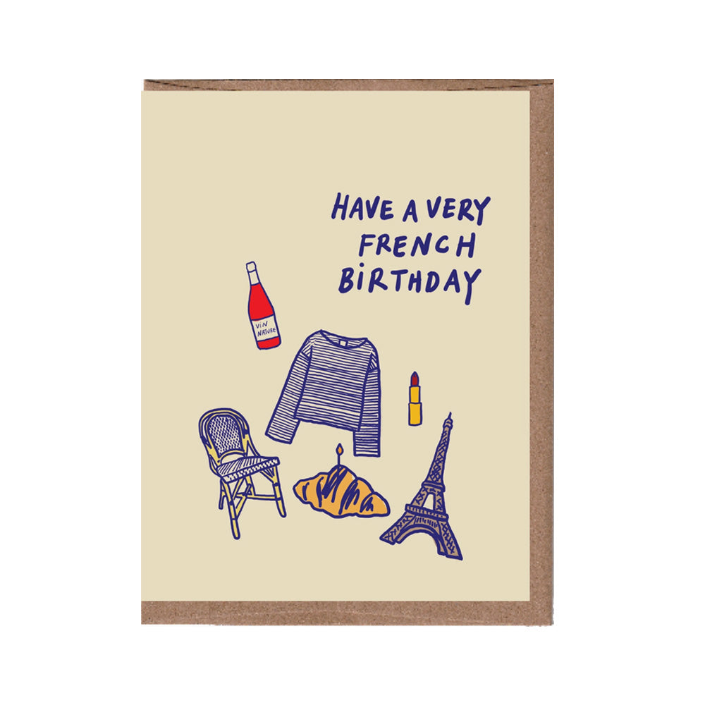 Greeting card with illustrations of a bottle, sweater, croissant, and Eiffel Tower with text 'Have a very French Birthday'.