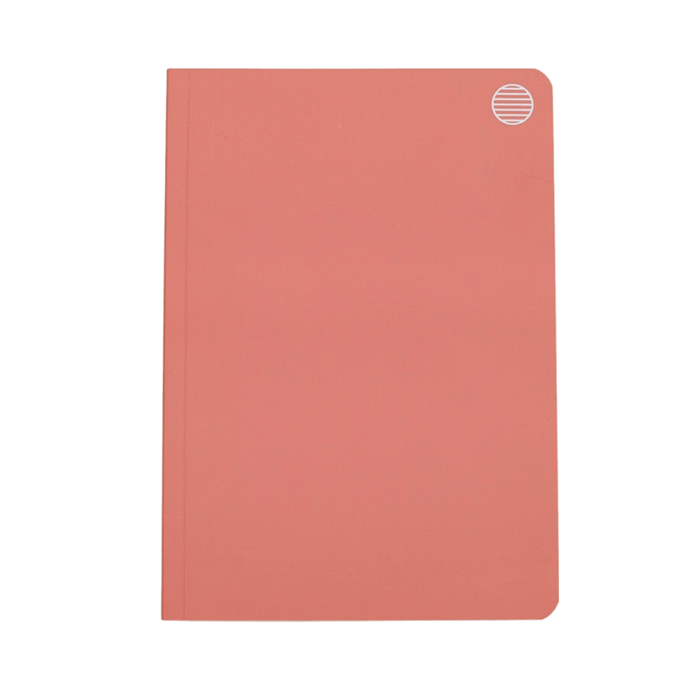 A pink softcover notebook with a circle logo in the top right corner.