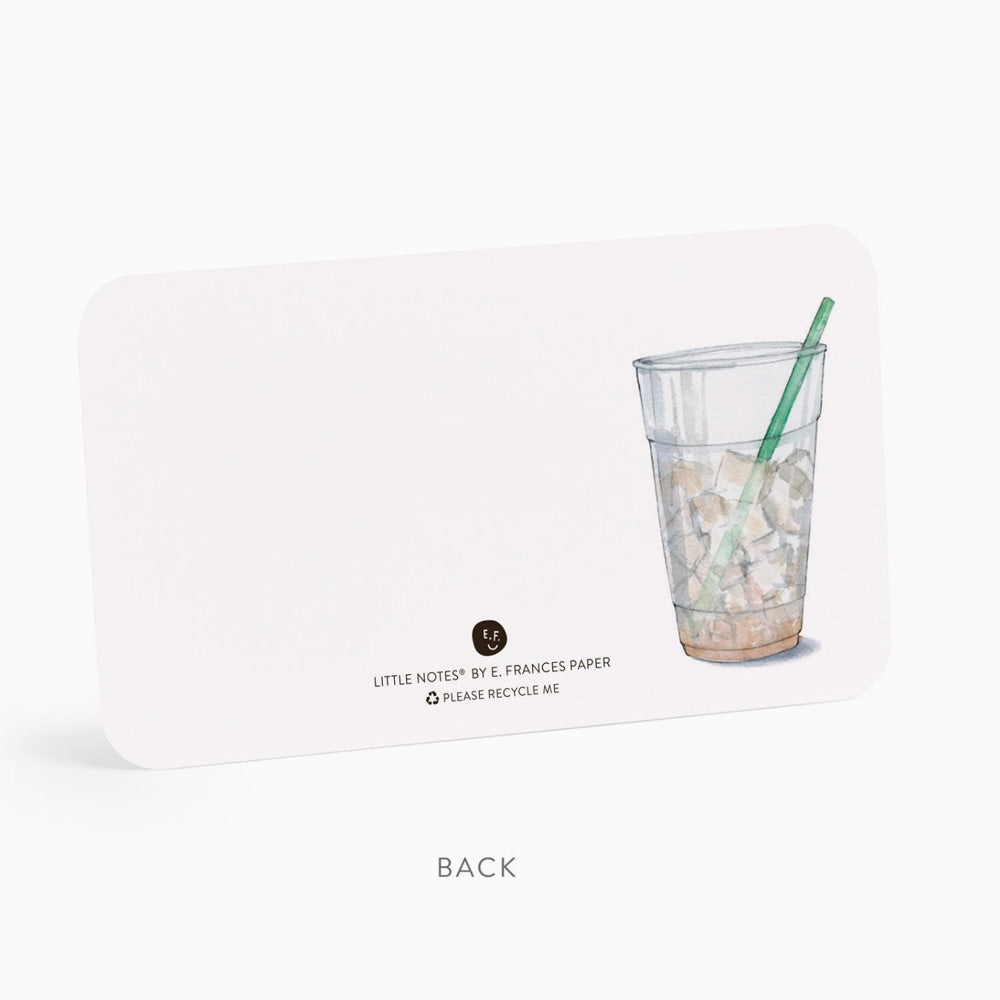 Glass of empty iced coffee with a straw on a white background, featuring 'Little Notes by E. Frances Paper' branding.