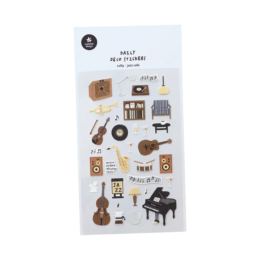 Sheet of decorative stickers with musical instruments and related items on a white background