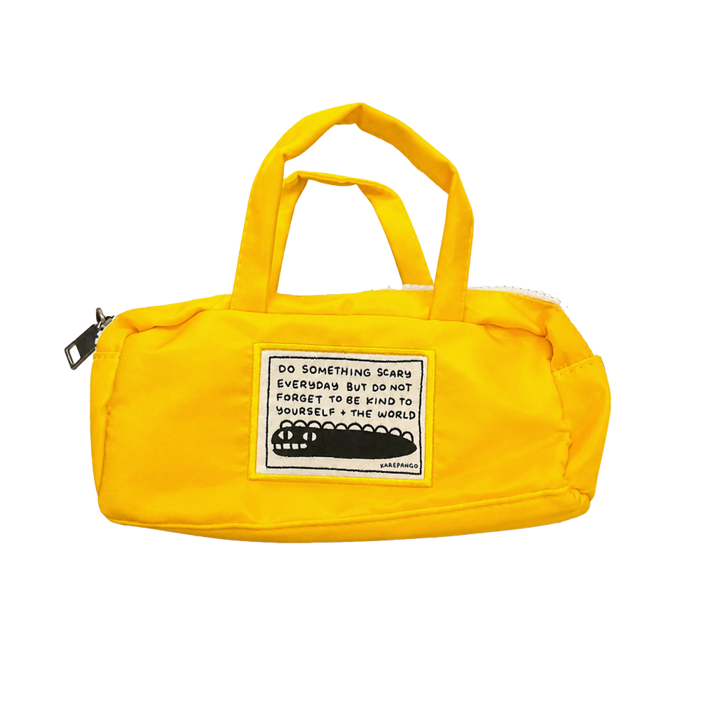 Yellow pencil pouch with a patch featuring an animal and text 