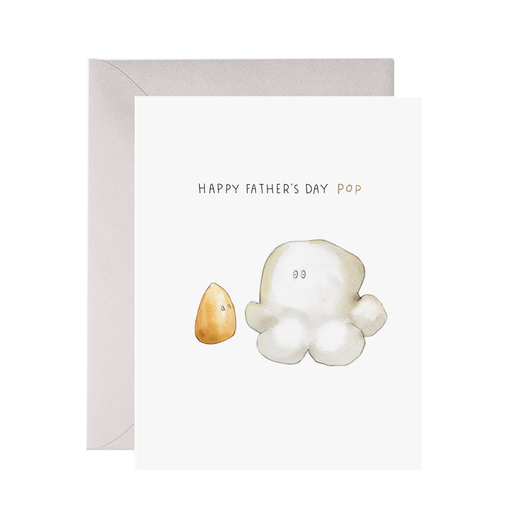 Greeting card with a popcorn kernel and a piece of popcorn 'Happy Father's Day Pop' text on a white background