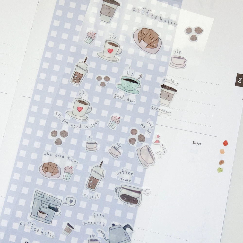 Set of coffee-themed stickers on a checkered background