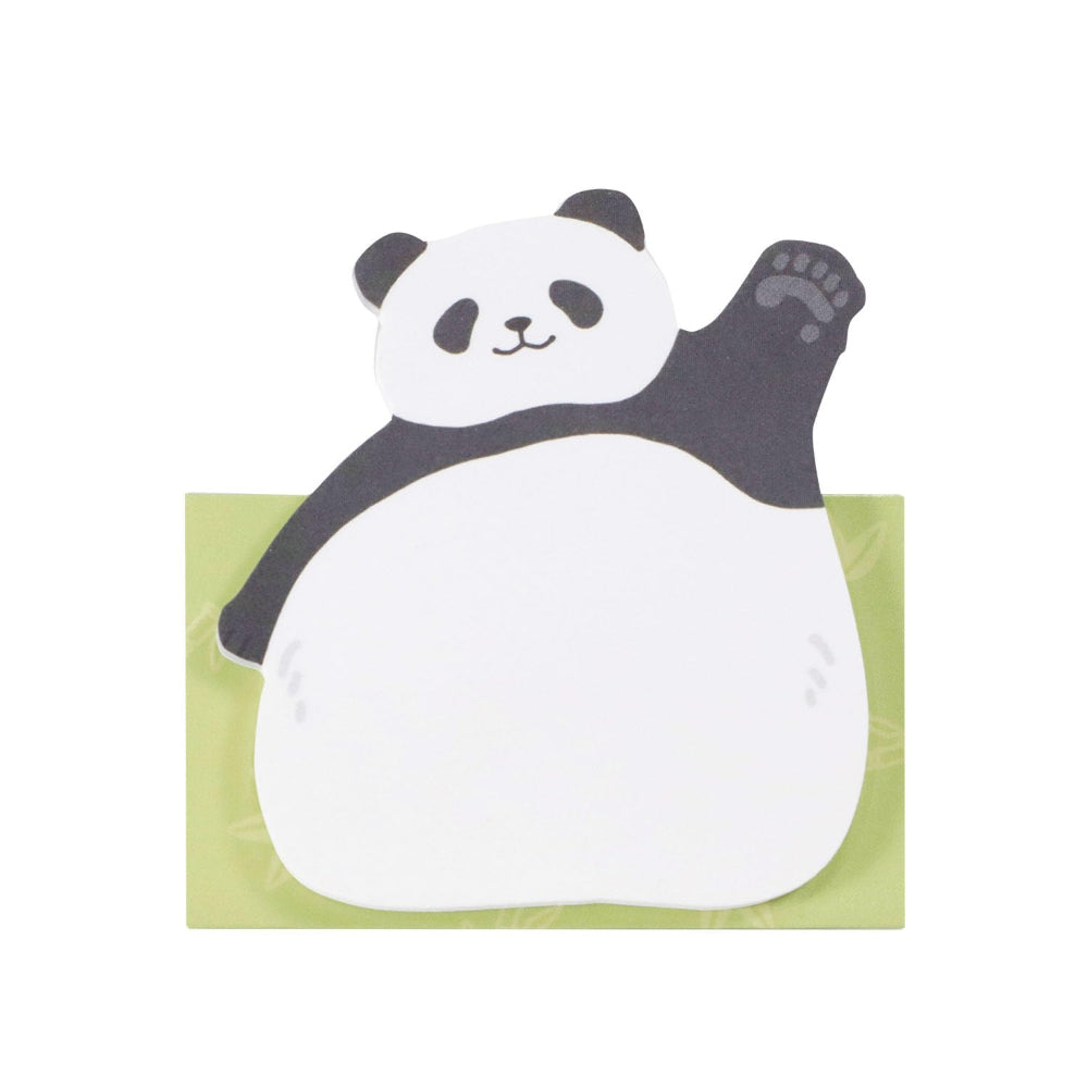 Panda-shaped towel on a green background