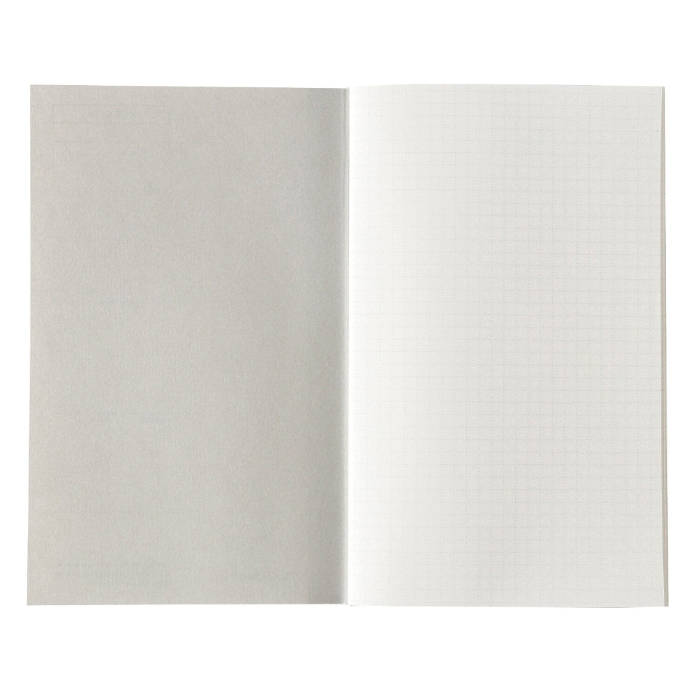 Open notebook with a grid page on a white background
