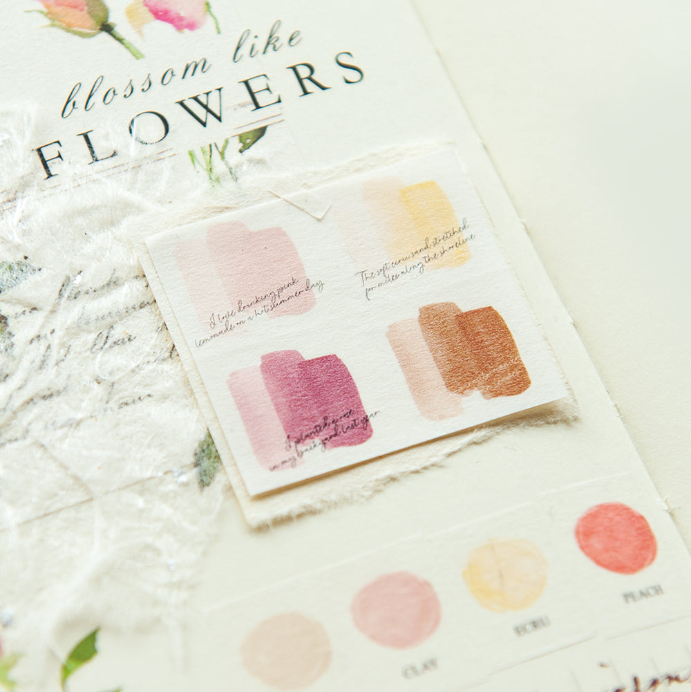 Color swatch book with floral design and text on a white background