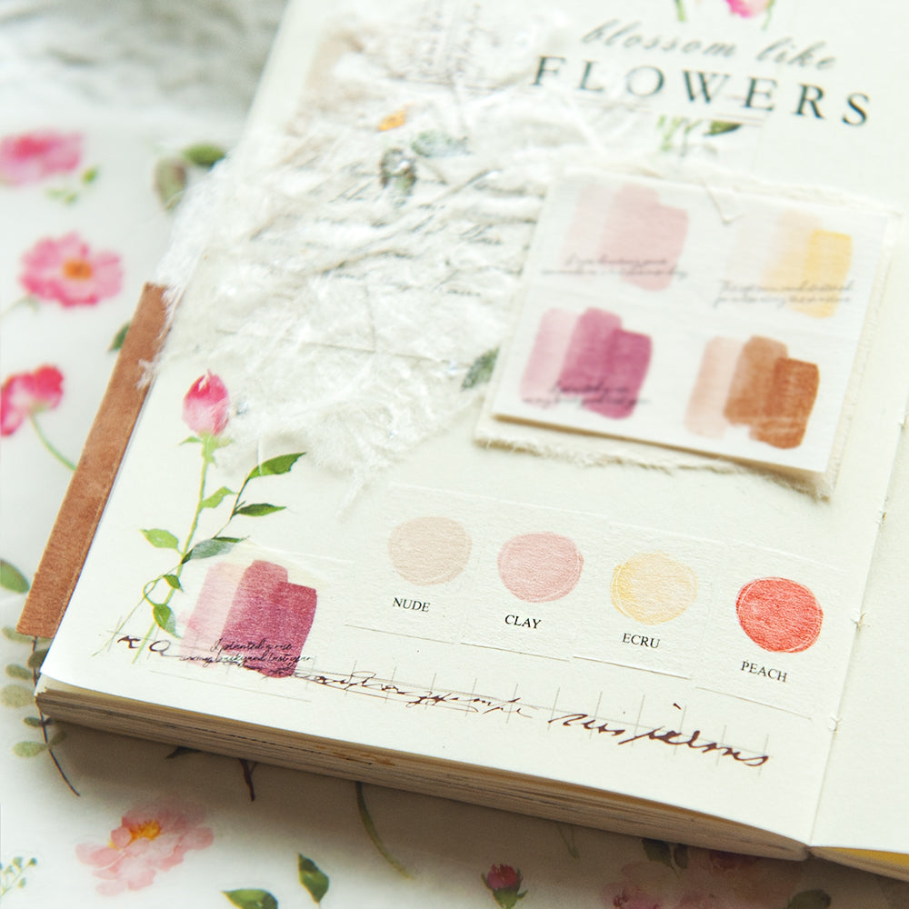 Color swatch book with floral design on a floral background
