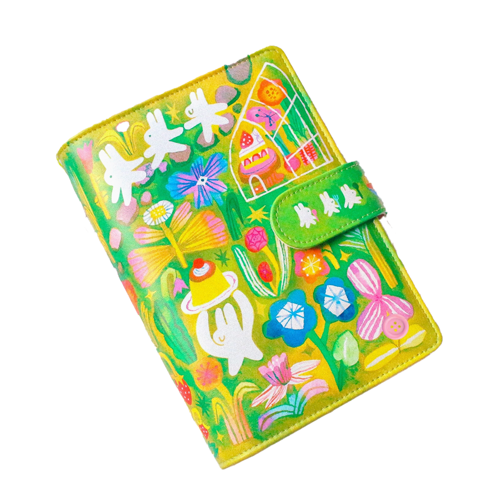 Colorful binder with cartoon designs on a white background