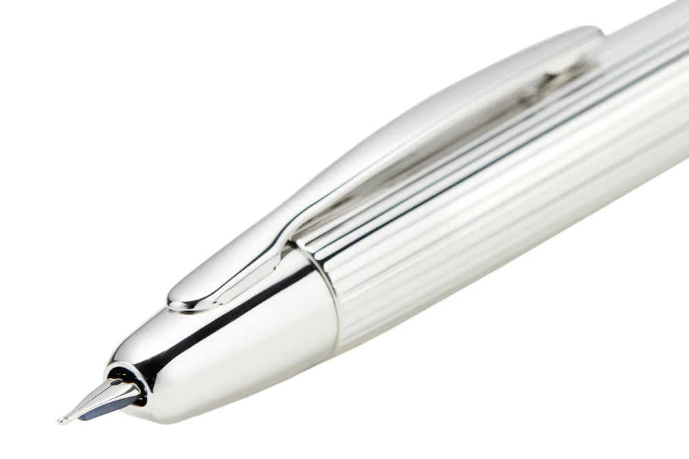 Silver pen on a white background