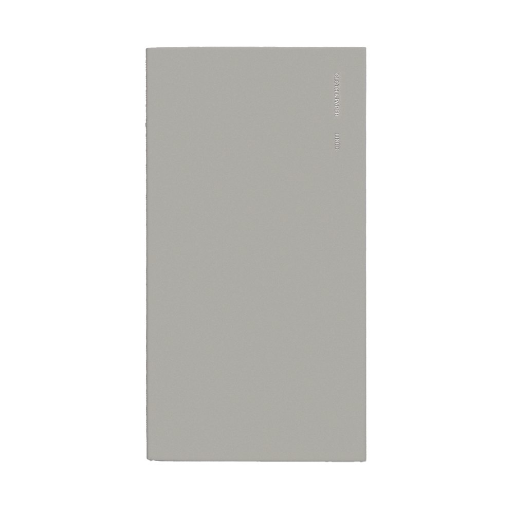 Gray notebook with silver foil on the side.