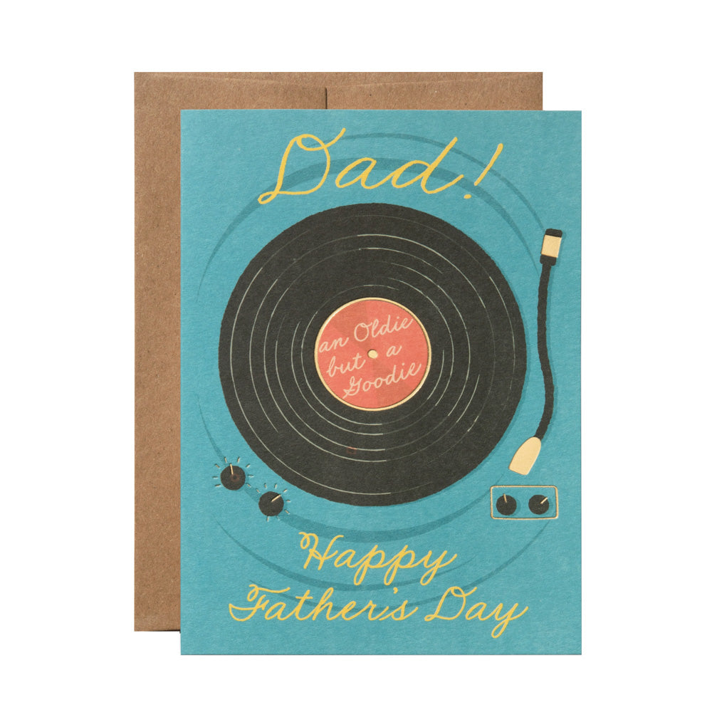 Father's Day card with vinyl record design and text on a blue background with the text "Dad! Happy Father's Day" on the top and bottom. The text "an Oldie but a Goodie" is on the center of the record.