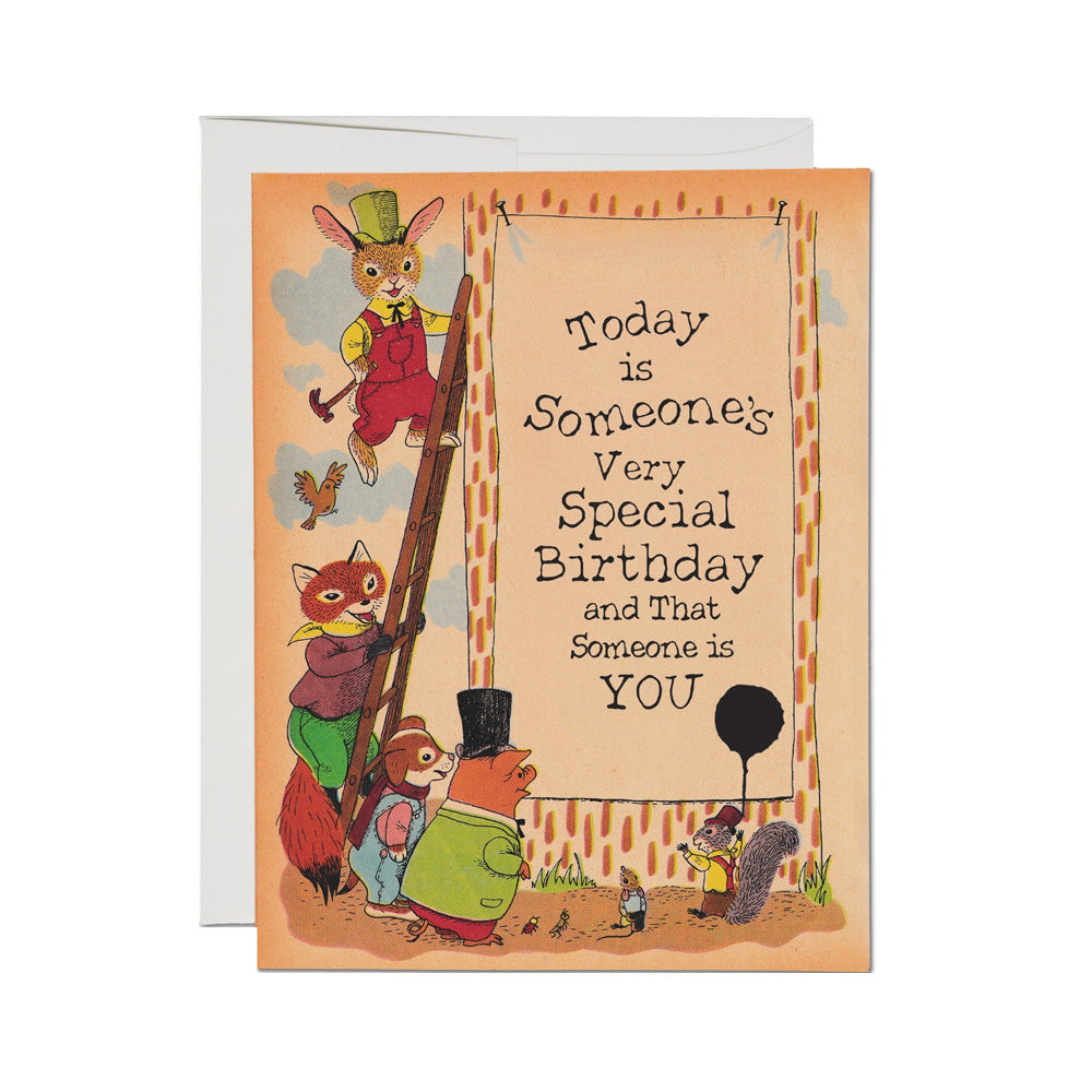 Card with multiple animals on or by a ladder hanging a banner that reads "Today is someone's very special birthday and that someone is you."