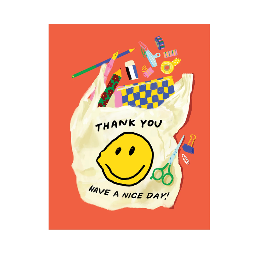Card with red background and bag illustration with stationery coming out of the top.