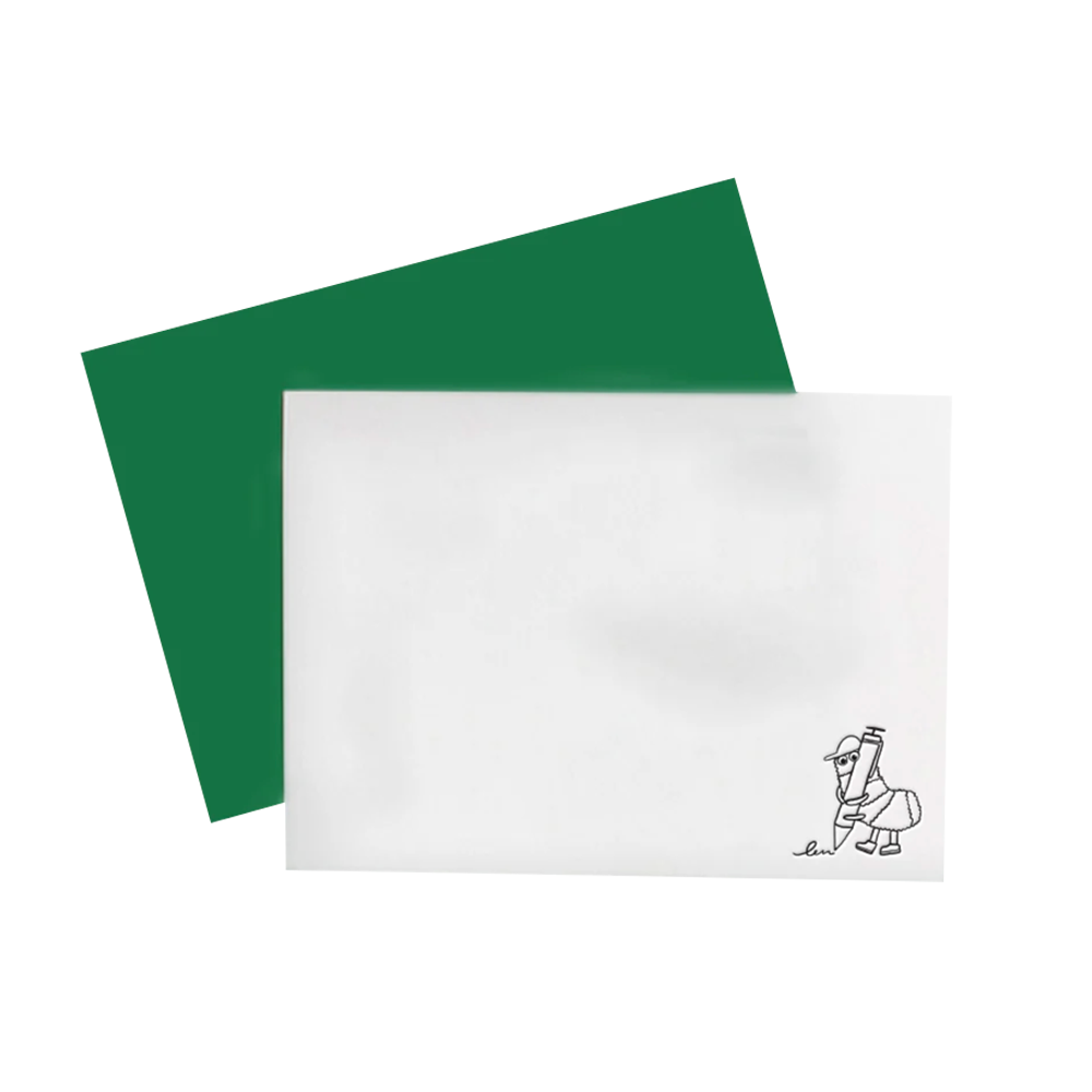 A white rectangular card with a small black line drawing in the lower right corner, shown with a dark green envelope behind it on a plain white background.