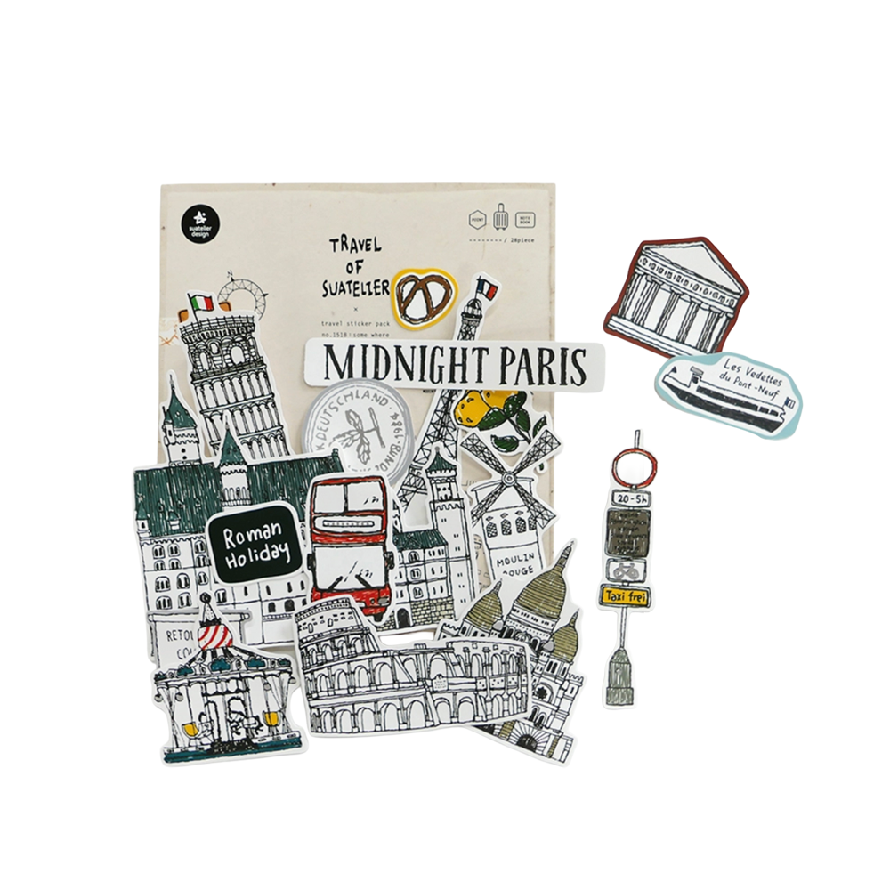A sticker pack of Suatelier travel stickers shown at an angle on a plain white background. 