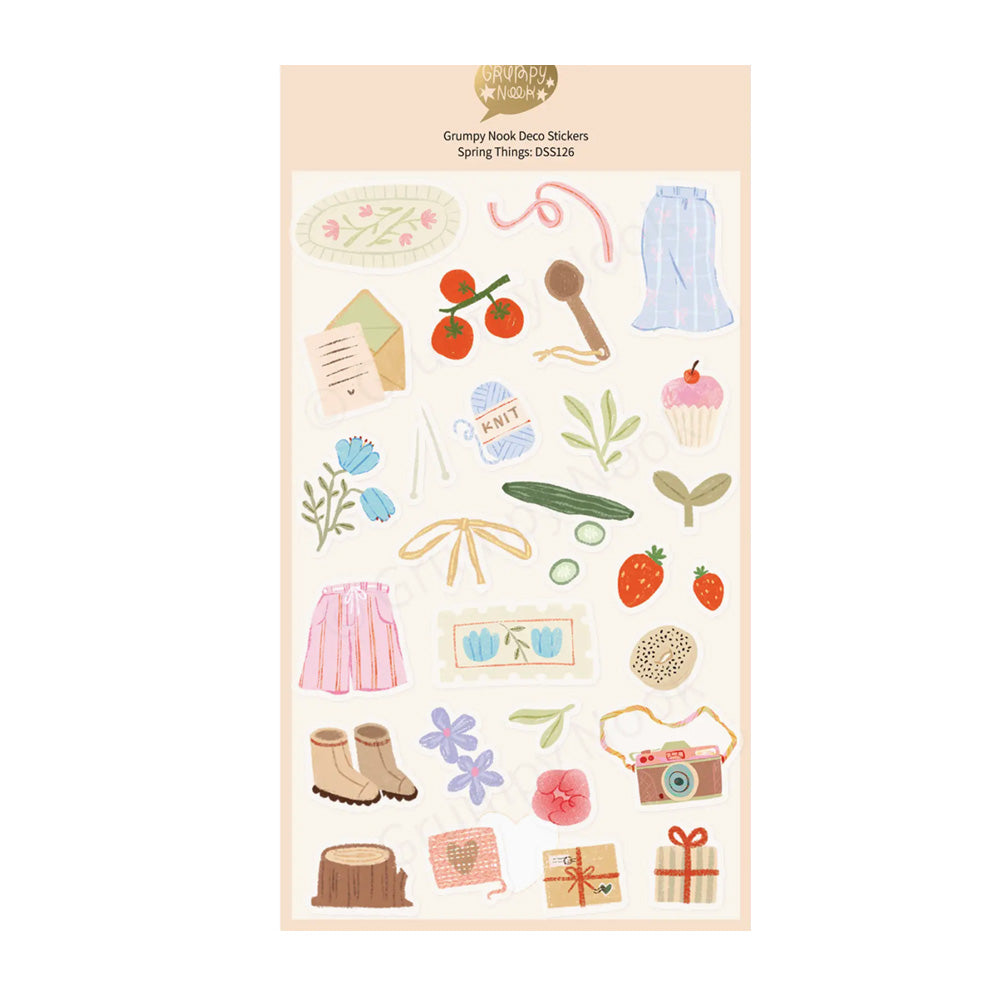 Pack of decorative stickers with various illustrations on a light pink background