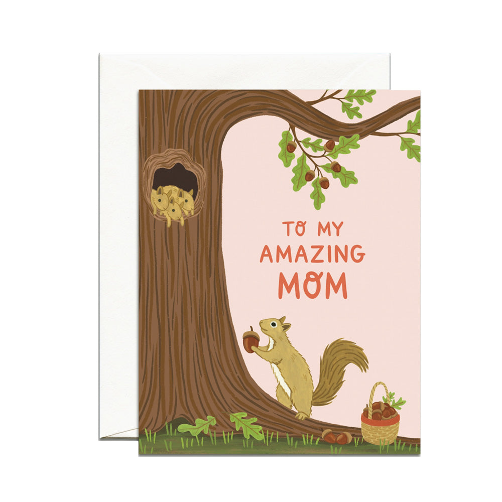 Greeting card with a squirrel and tree design, featuring text 'To my amazing mom' on a white background.