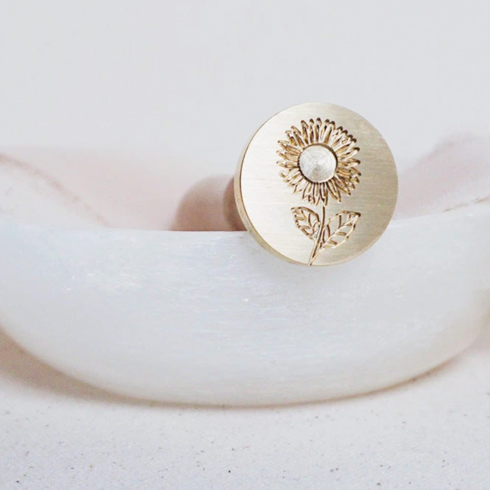 Gold wax seal head with sunflower design