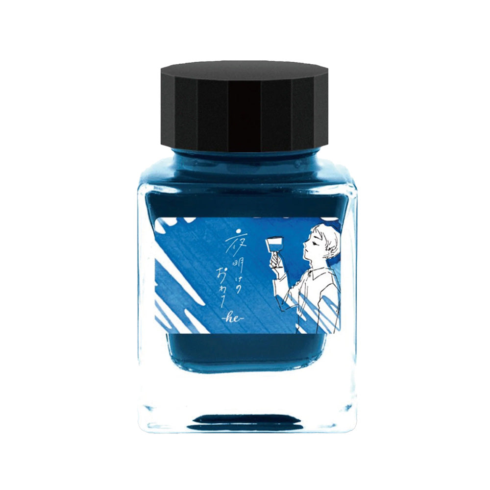 Blue ink bottle with black cap on a white background