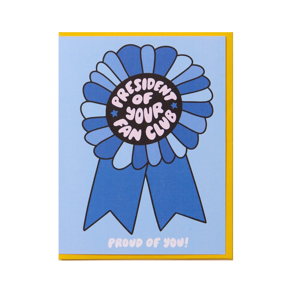 Card with blue ribbon design and text, "President of your fan club" and "Proud of You!" on the bottom on a light blue background